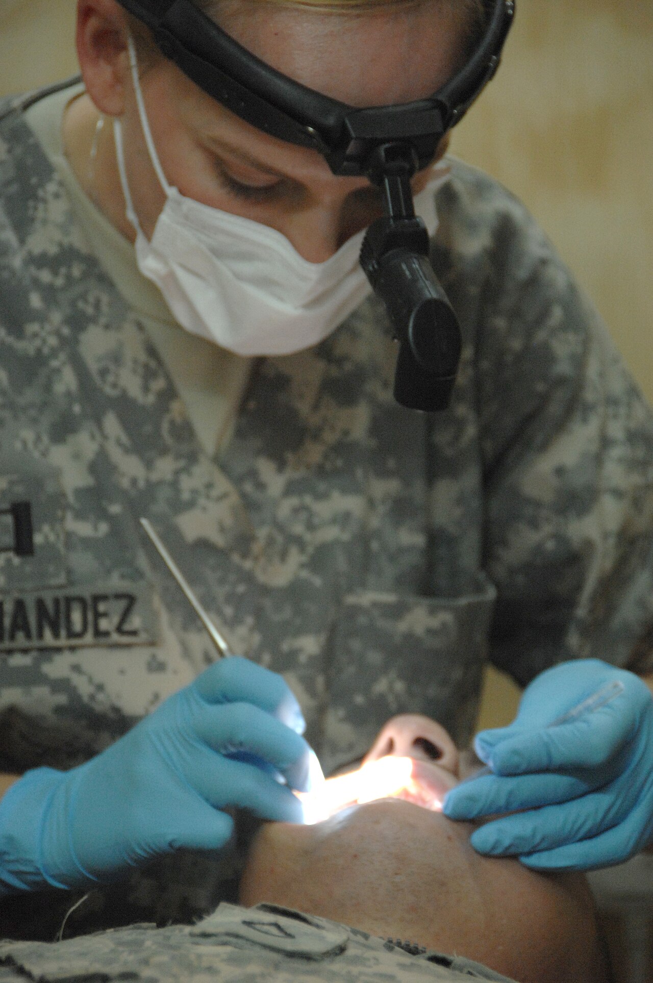 Dentist performing a dental checkup